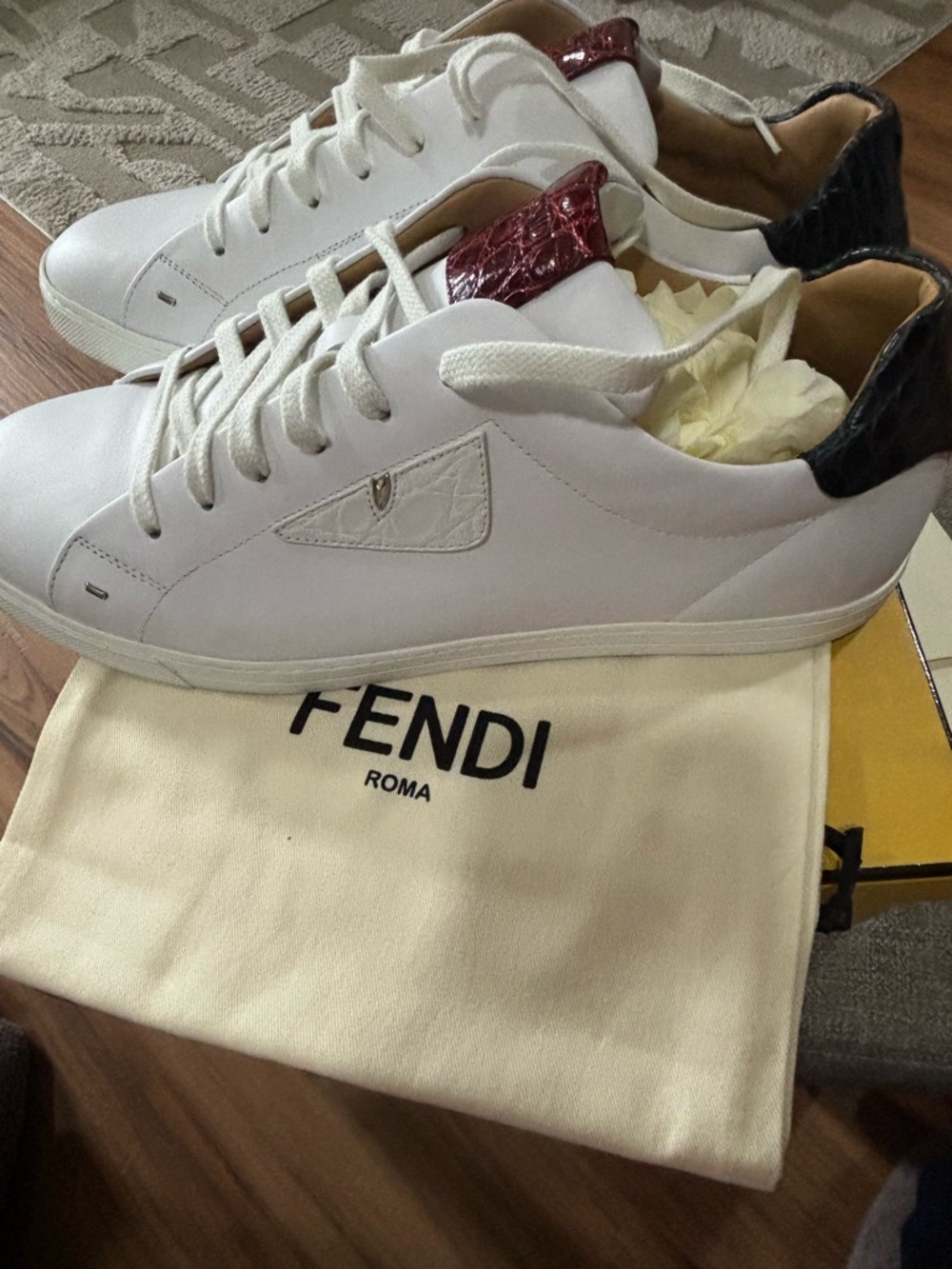 Authentic Men Fendi Sneakers with crocodile print on tongue and heal of sneaker.
